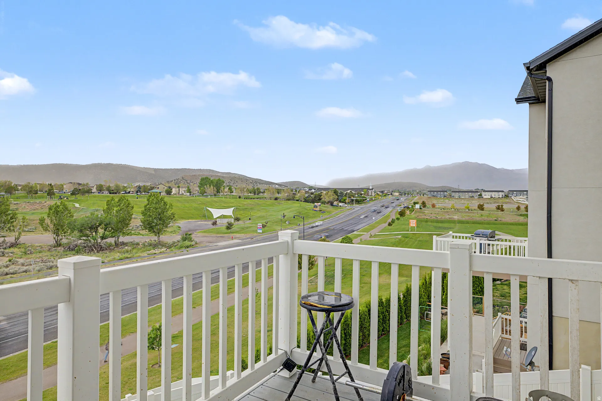 Balcony featuring a white railing and composite decking