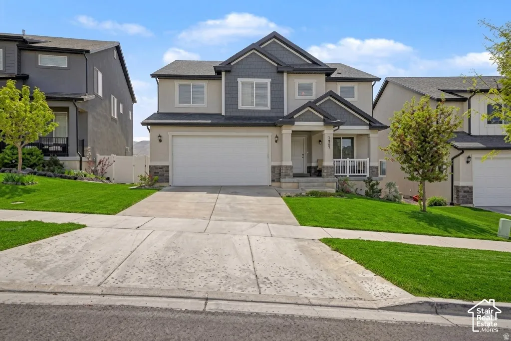 Ai enhanced front yard of this modern two-story residence featuring a two-car garage, covered entry porch with white railing, and a combination of siding and stone veneer exterior