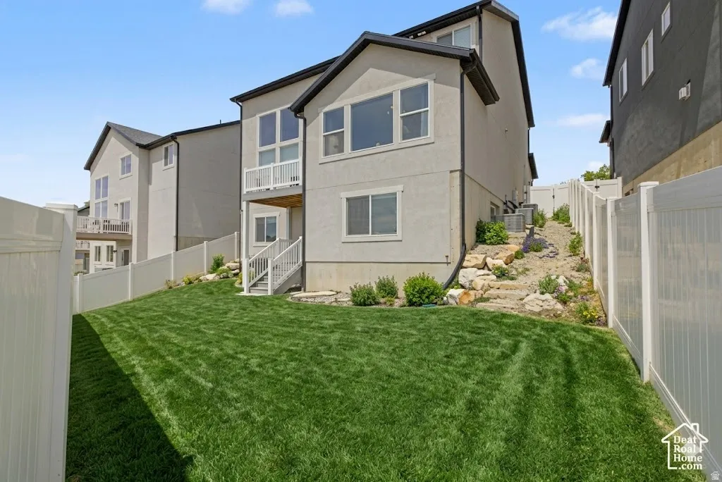 Ai enhanced backyard  green lawn, a white privacy fence, and a multi-level stucco facade