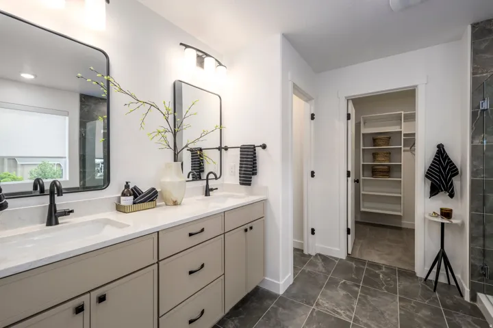 Spa-inspired primary bathroom designed for relaxation. * model home photo