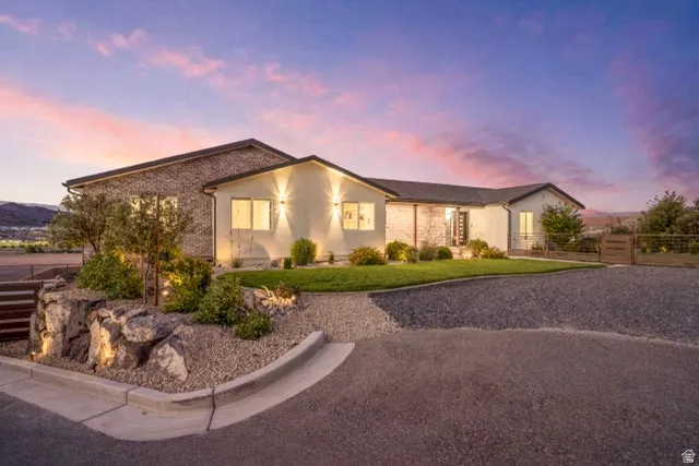 Contemporary exterior featuring stone accents and stucco siding