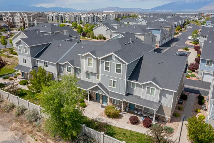 Modern townhome residences featuring multi-level construction with gabled roofs