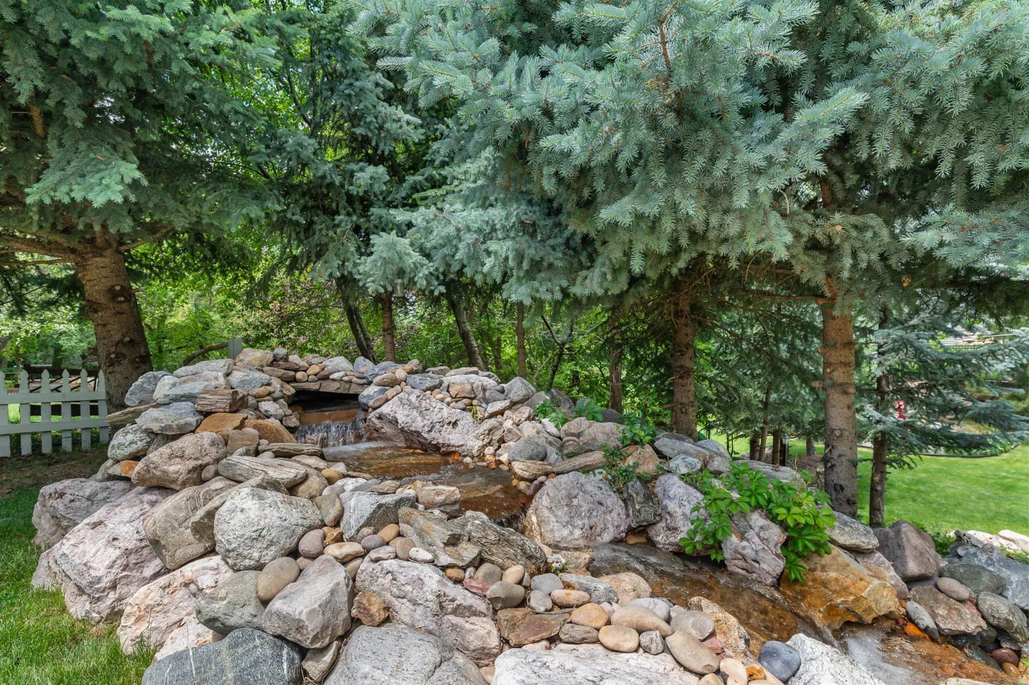 Terraced rock water feature with a flowing waterfall