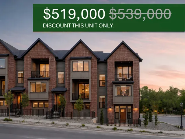 Three-story townhome with brick and siding exterior