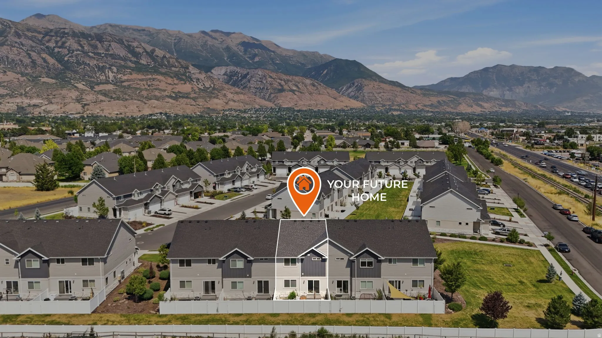 Townhome row with light gray siding and dark gray shingle roofs