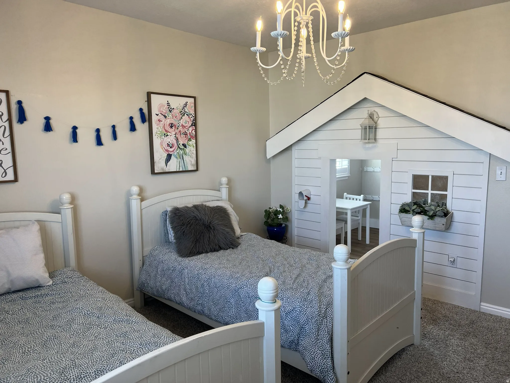 Custom built-in playhouse structure featuring a window box