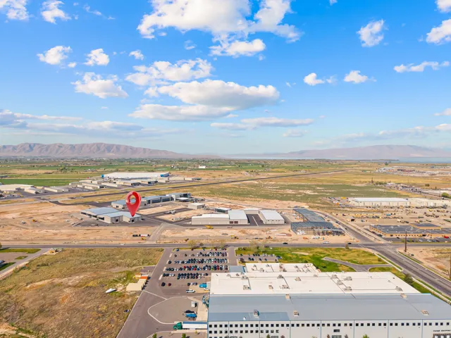 Aerial perspective highlighting multiple industrial and commercial properties