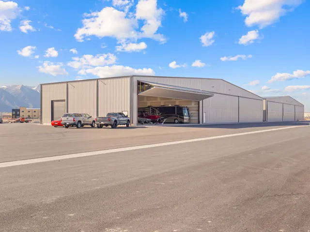 Industrial metal building with large hangar-style doors