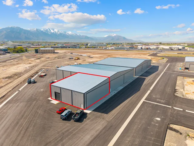 Industrial building featuring a metal roof and panel siding