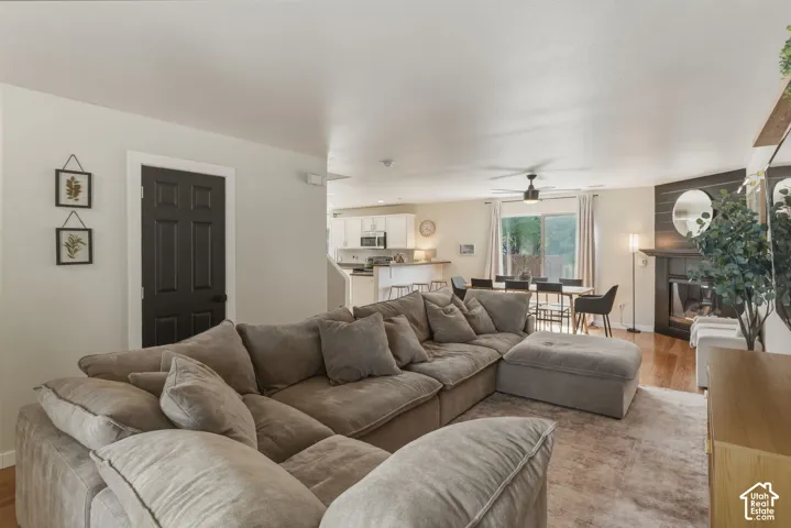 Open-concept living area with wood-finish flooring