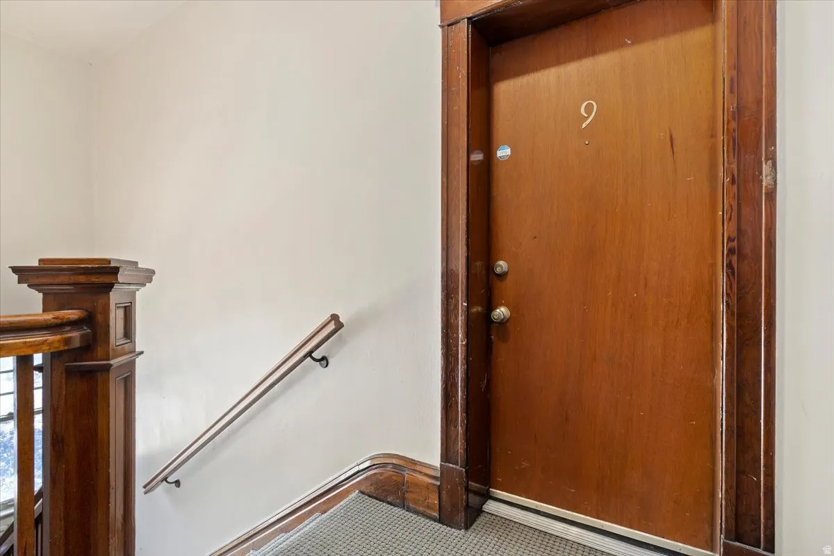 Solid wood entry door with wood trim surround