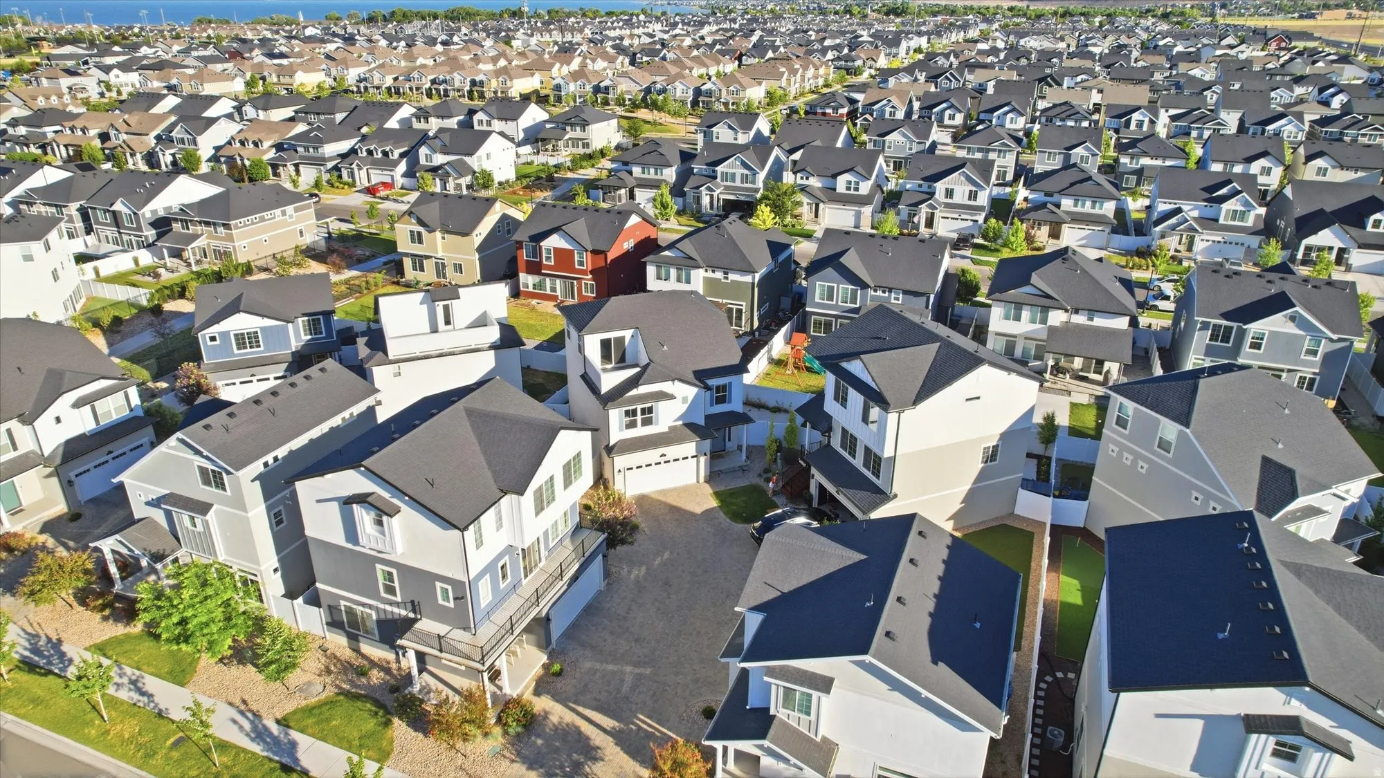 Aerial perspective showcasing a developed residential community with consistent architectural styling
