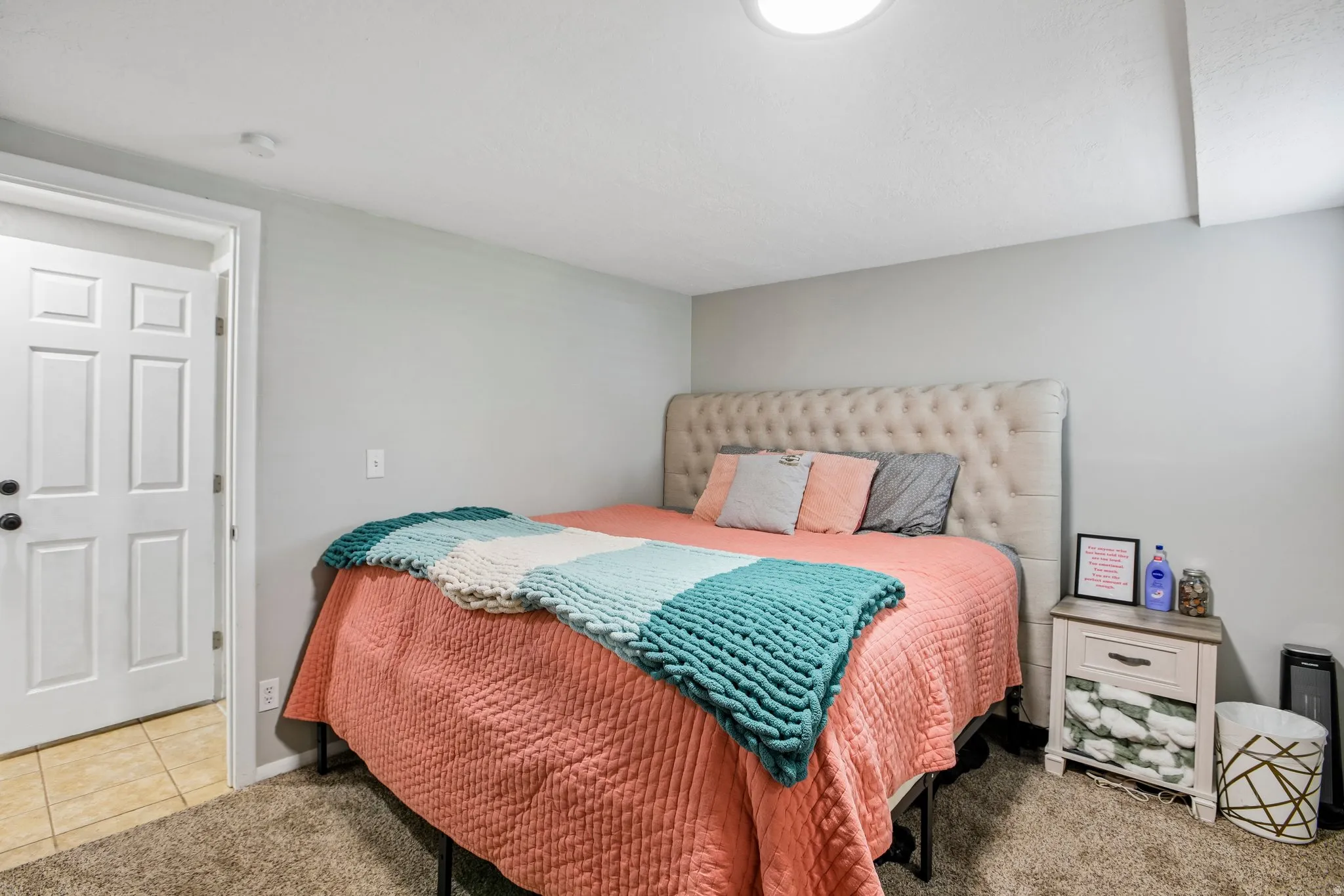 Bedroom featuring neutral wall paint and plush carpet flooring