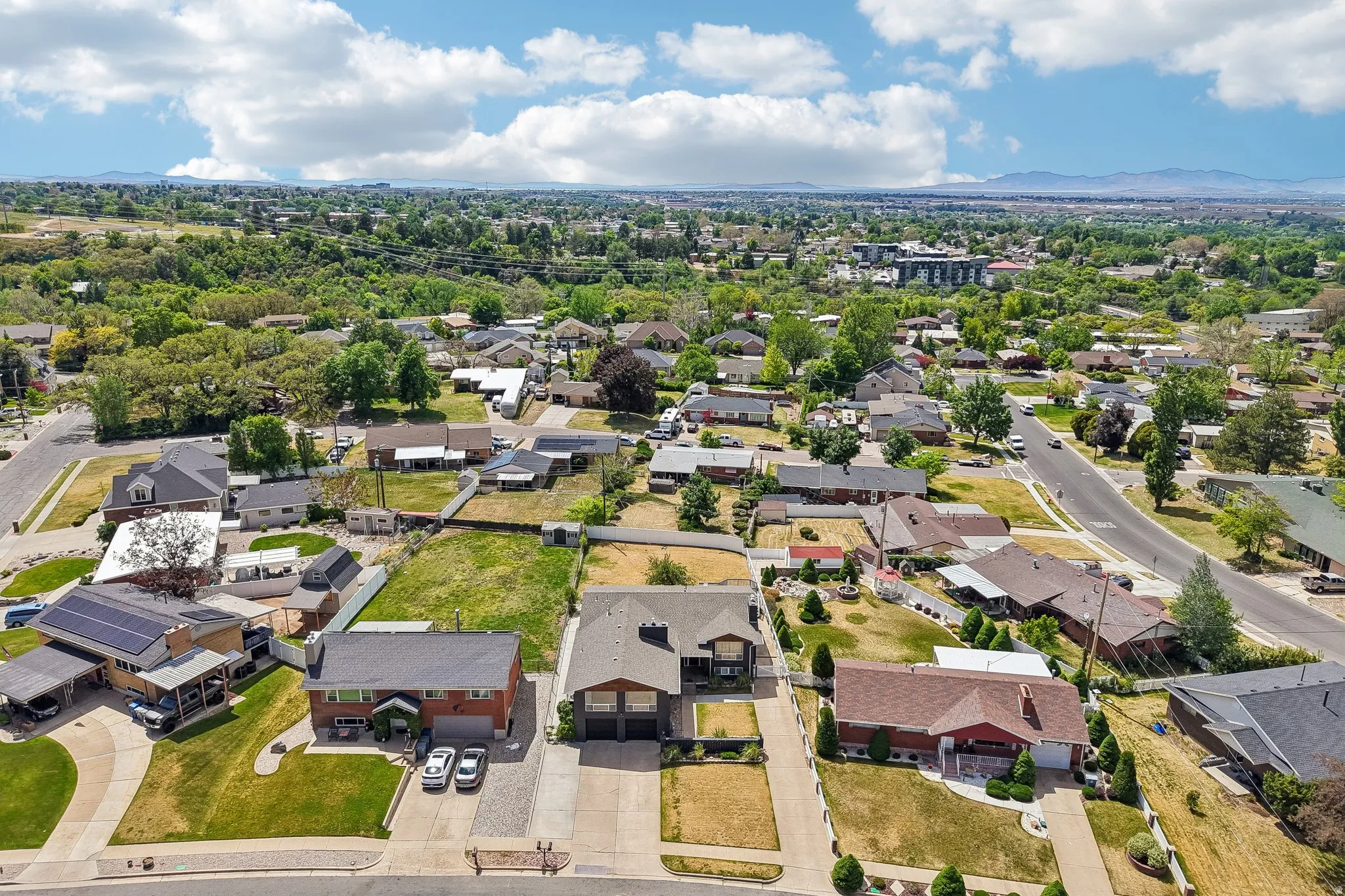 Aerial perspective showcasing a residential neighborhood with varied architectural styles