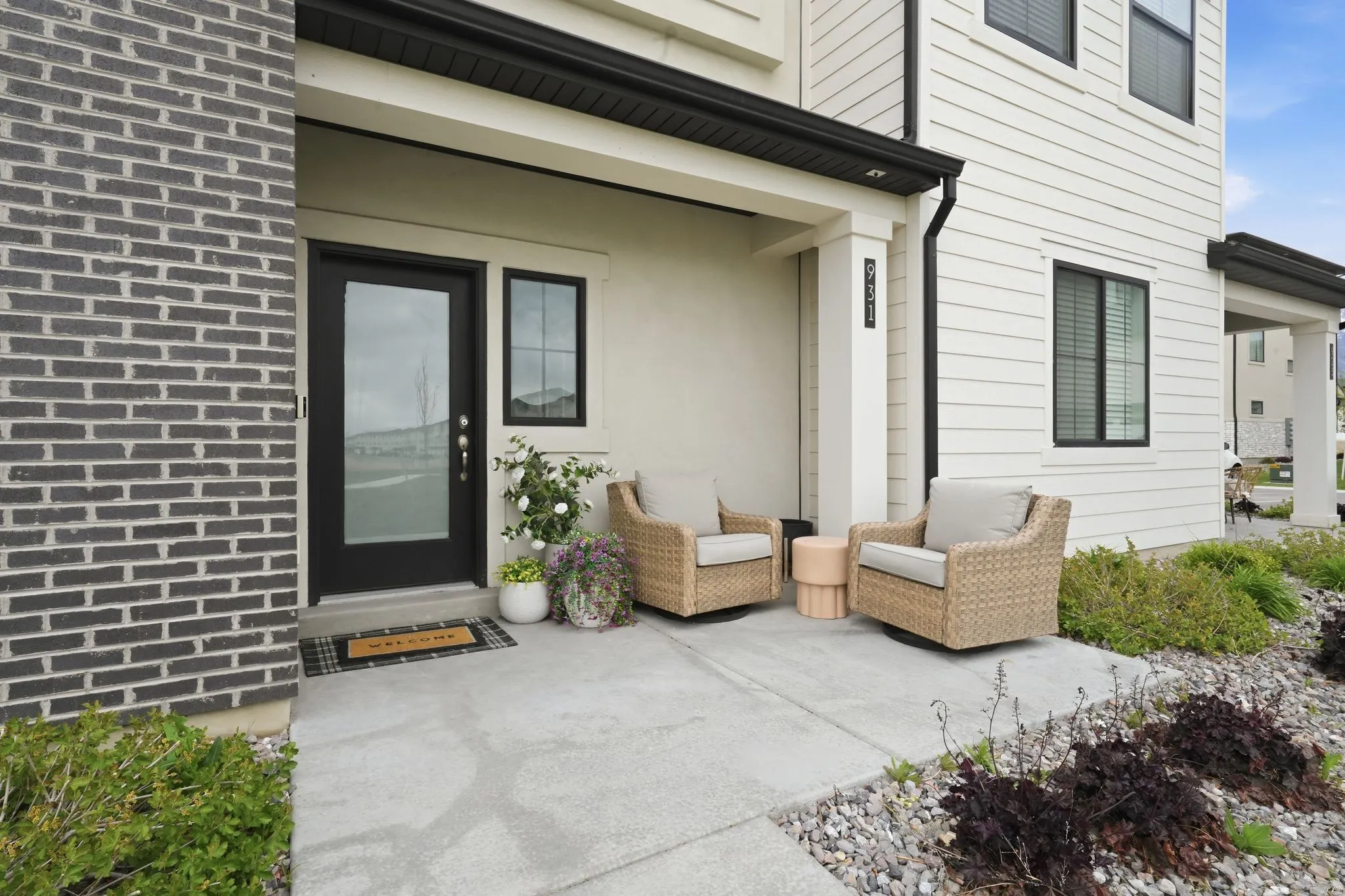 Inviting covered porch with concrete flooring