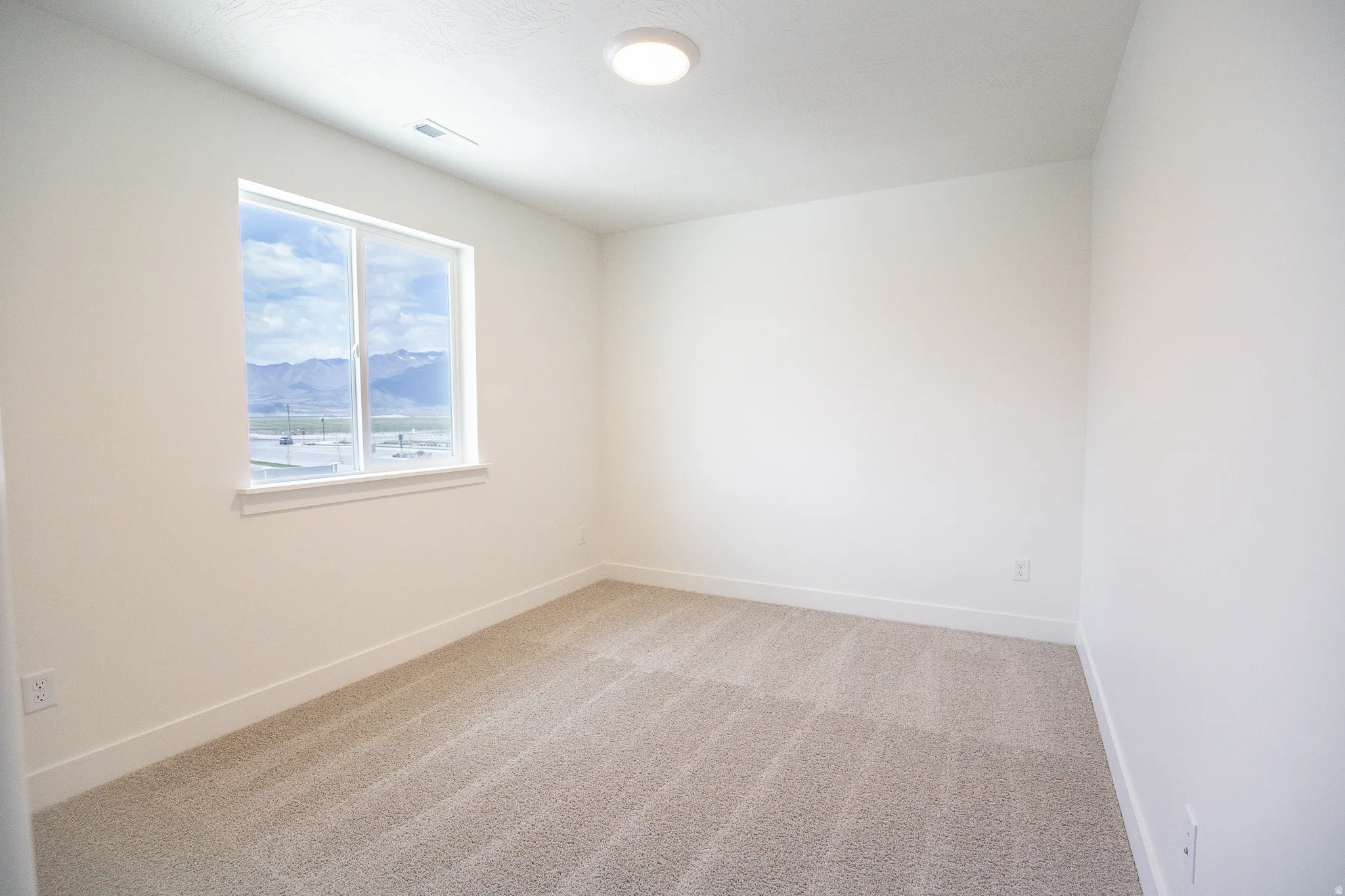 Bedroom #4 with walk-in closet.