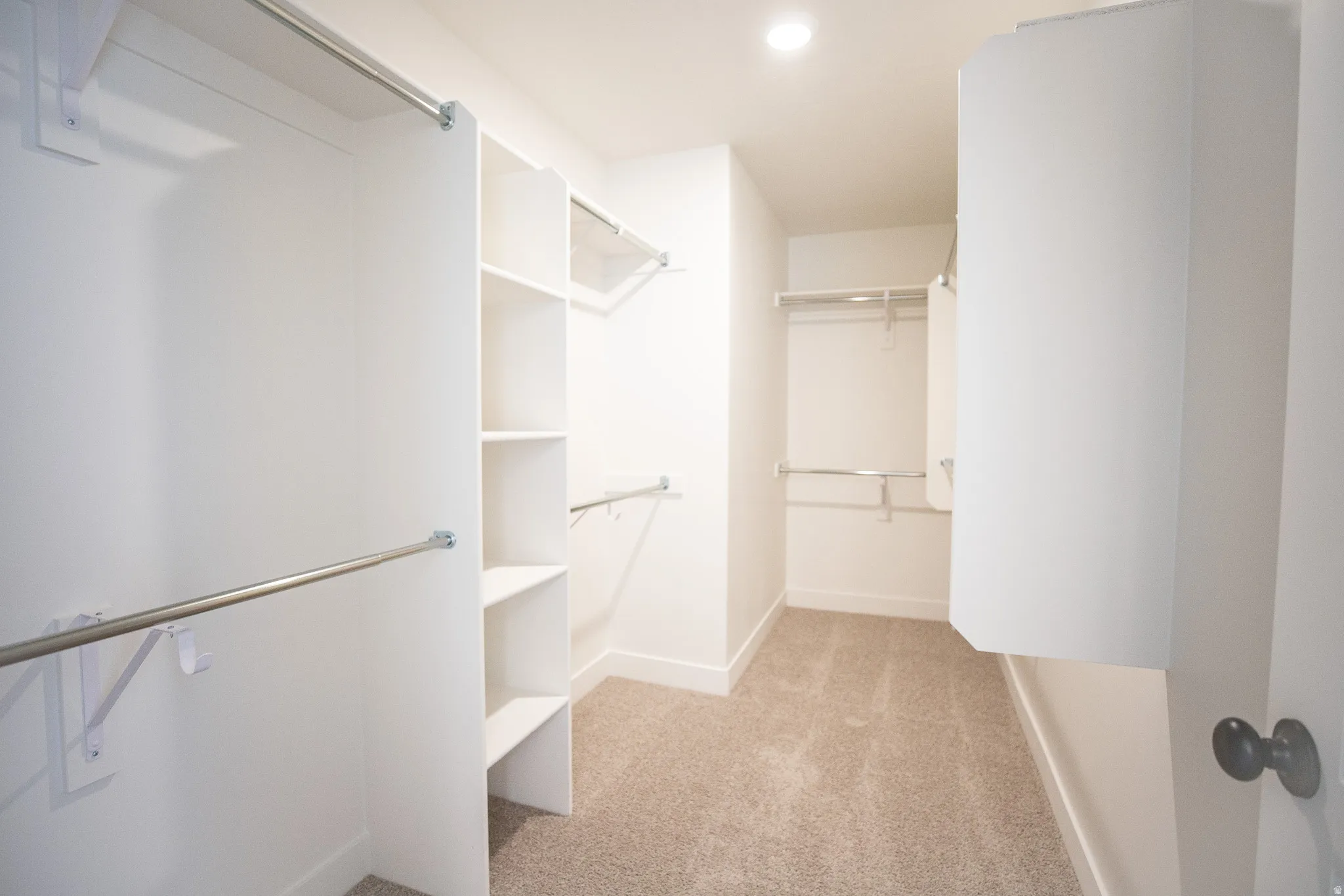 Spacious walk-in closet as part of primary suite.