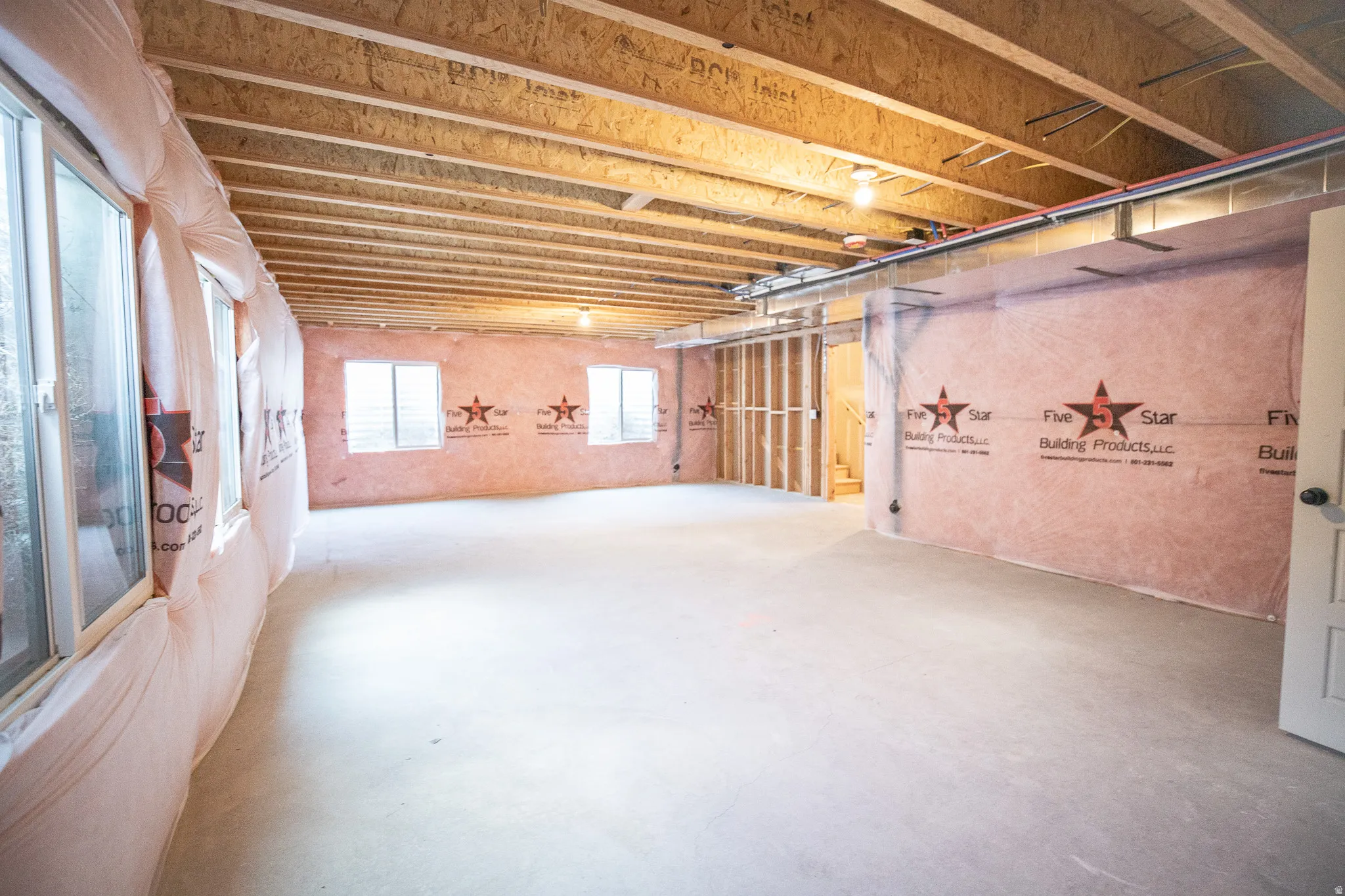 Unfinished basement with potential for full bathroom, large family/game room and one bedroom.
