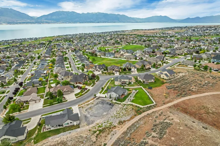 Aerial perspective of a developed residential community featuring individual residences on curved streets