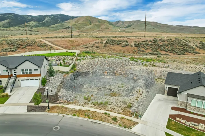 Cleared building site with excavated foundation
