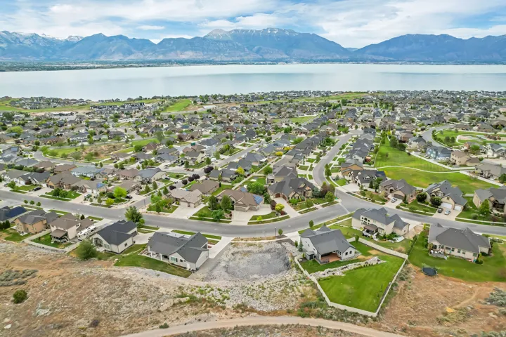 Established residential neighborhood featuring a lake and mountain backdrop