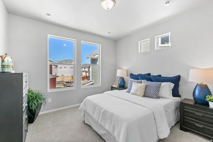 Light gray walls complemented by gray carpeting