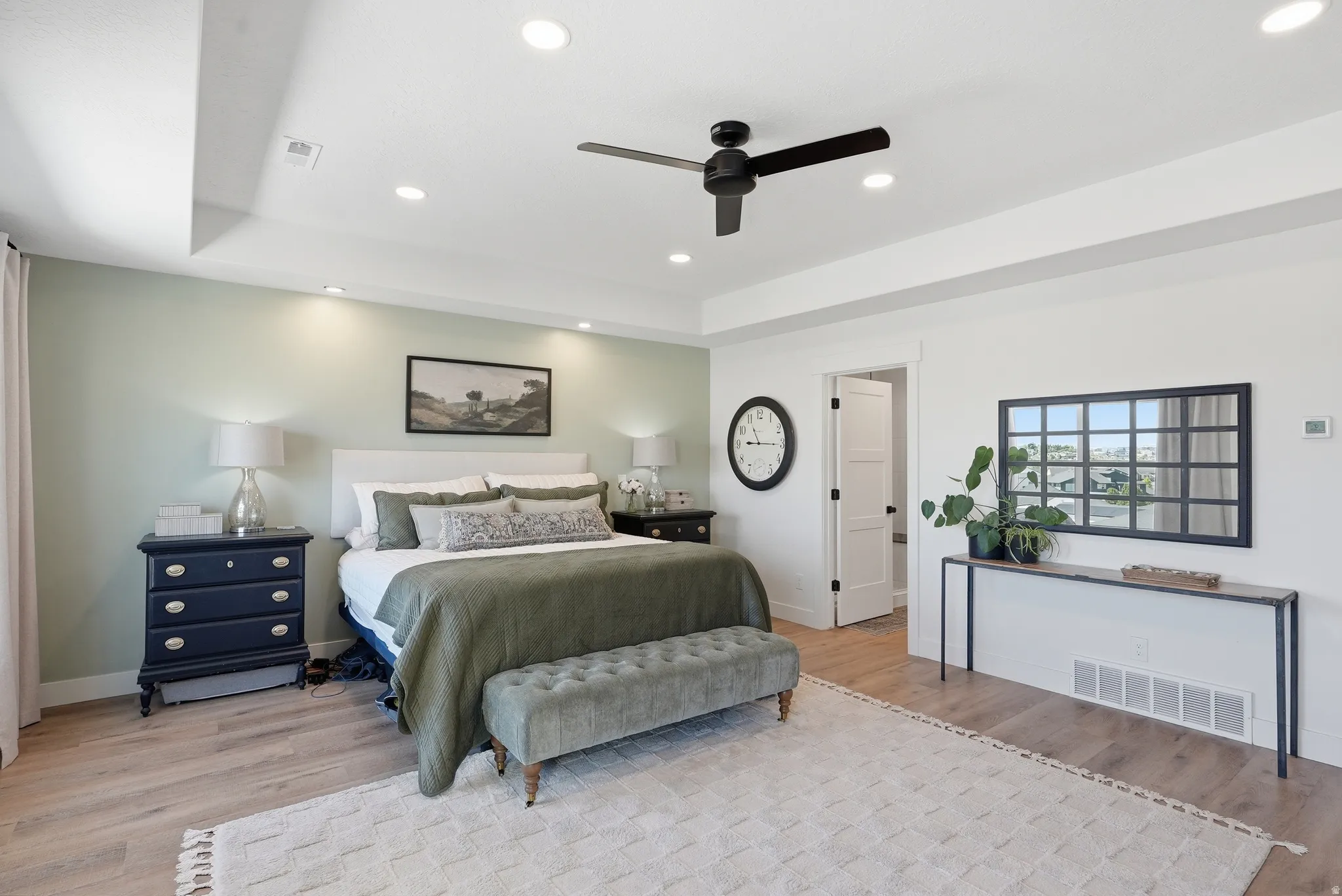 Recessed lighting illuminates LVP flooring