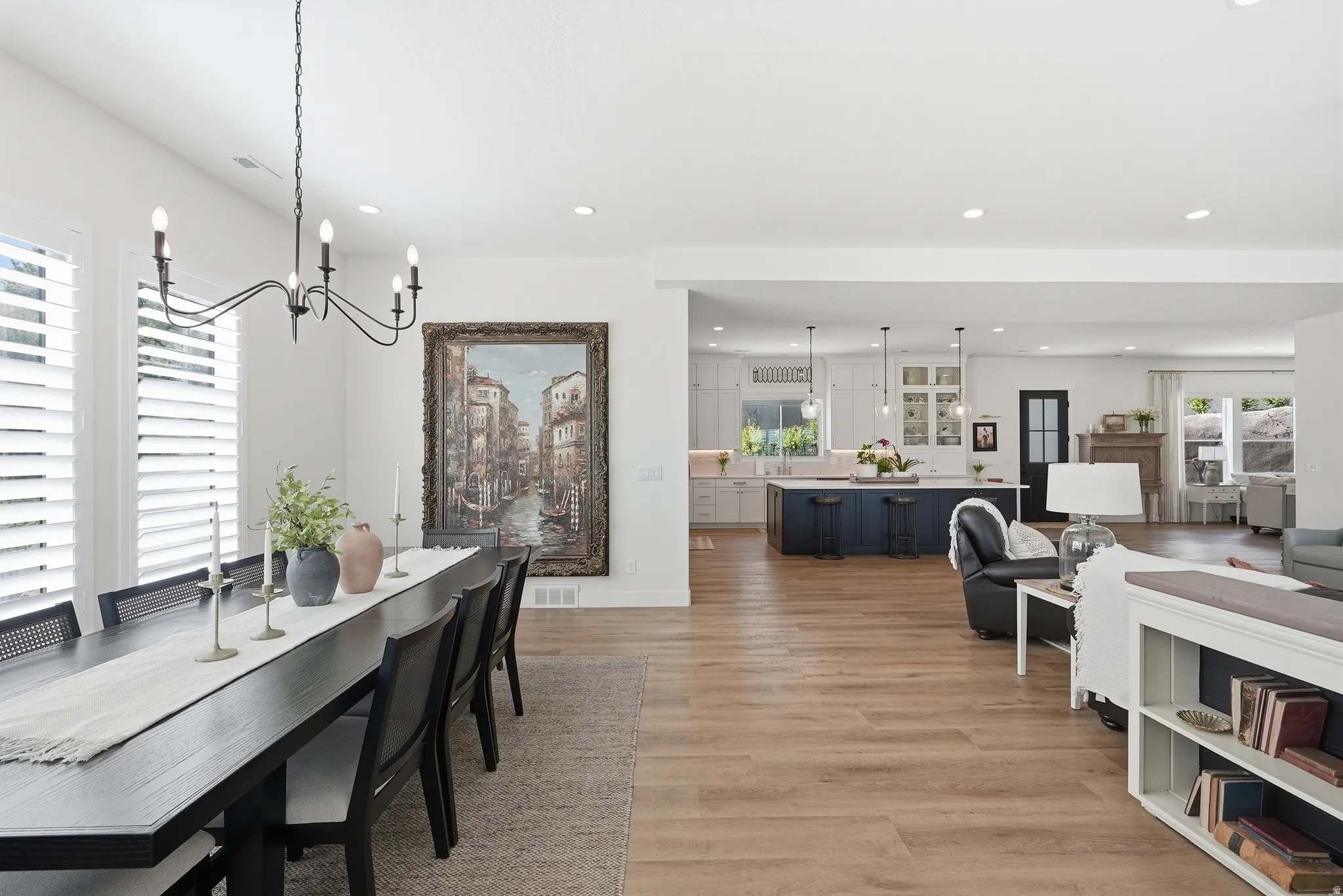 Open-concept living space featuring LVP flooring