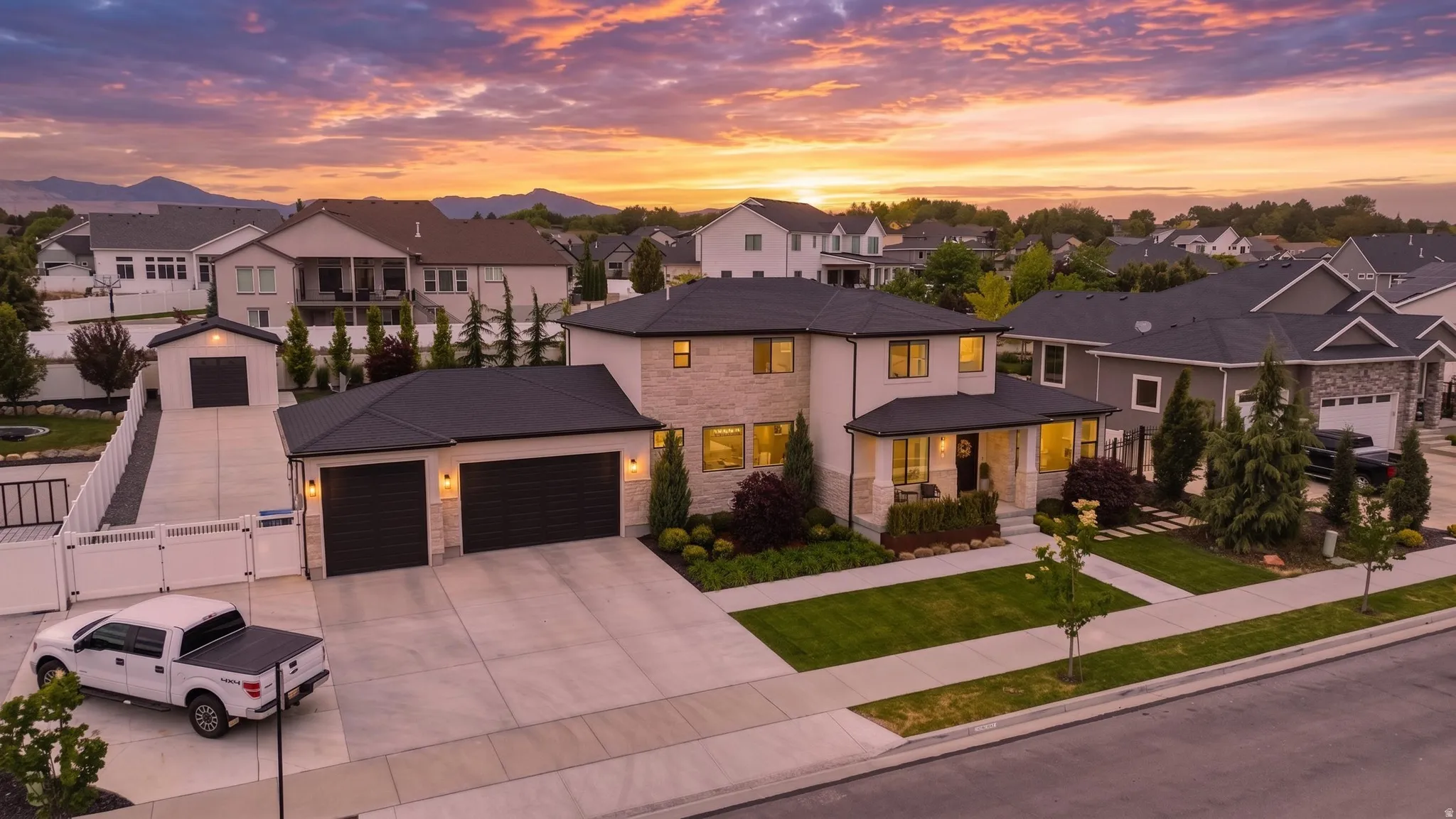 Modern home exterior featuring stone and stucco finishes