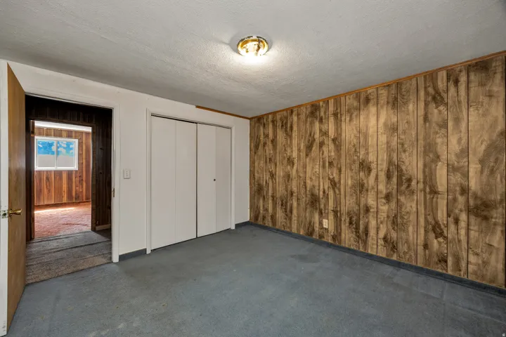 Interior room featuring wood paneling