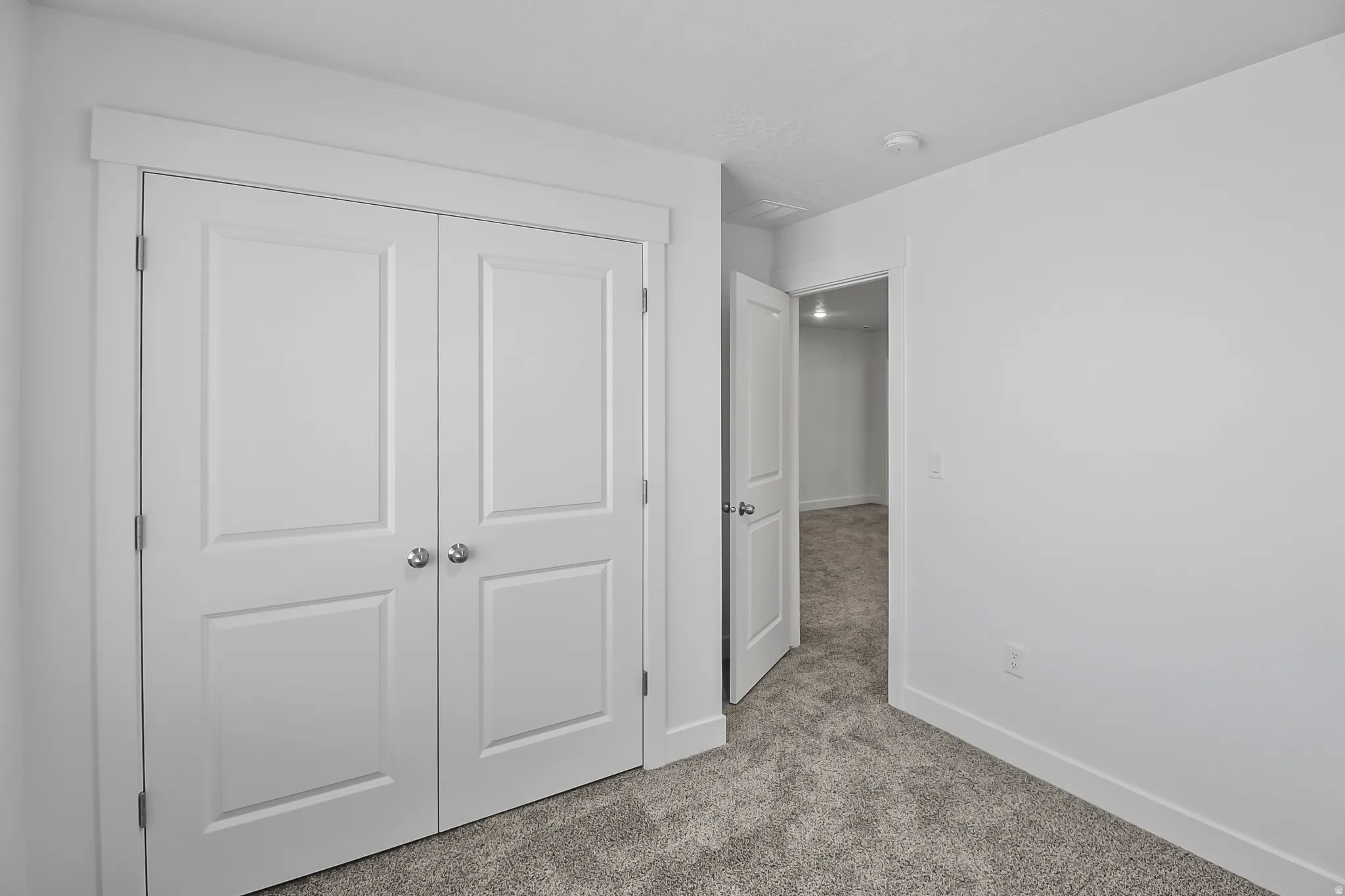 Neutral gray carpeting