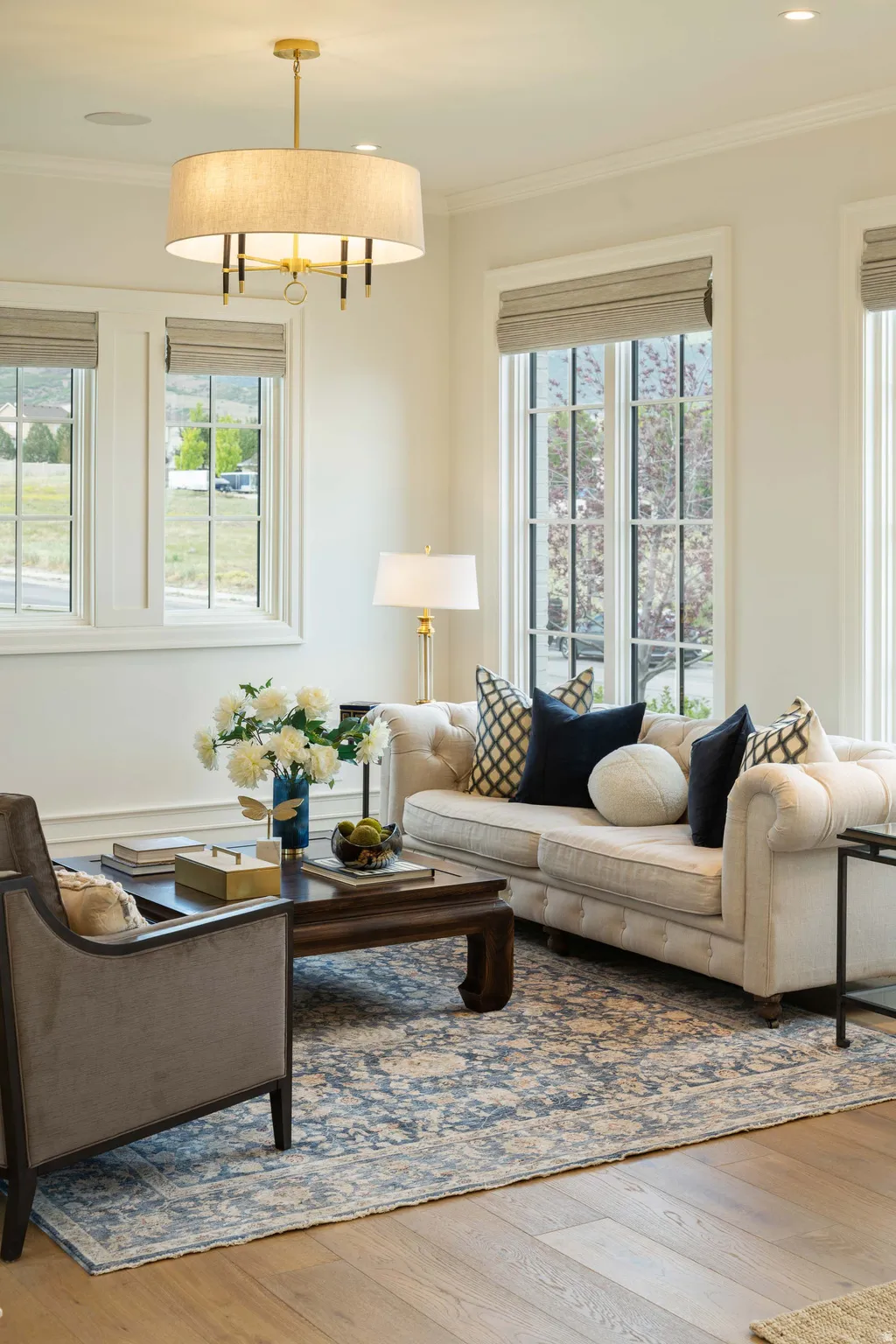 Hardwood-style flooring with a decorative area rug