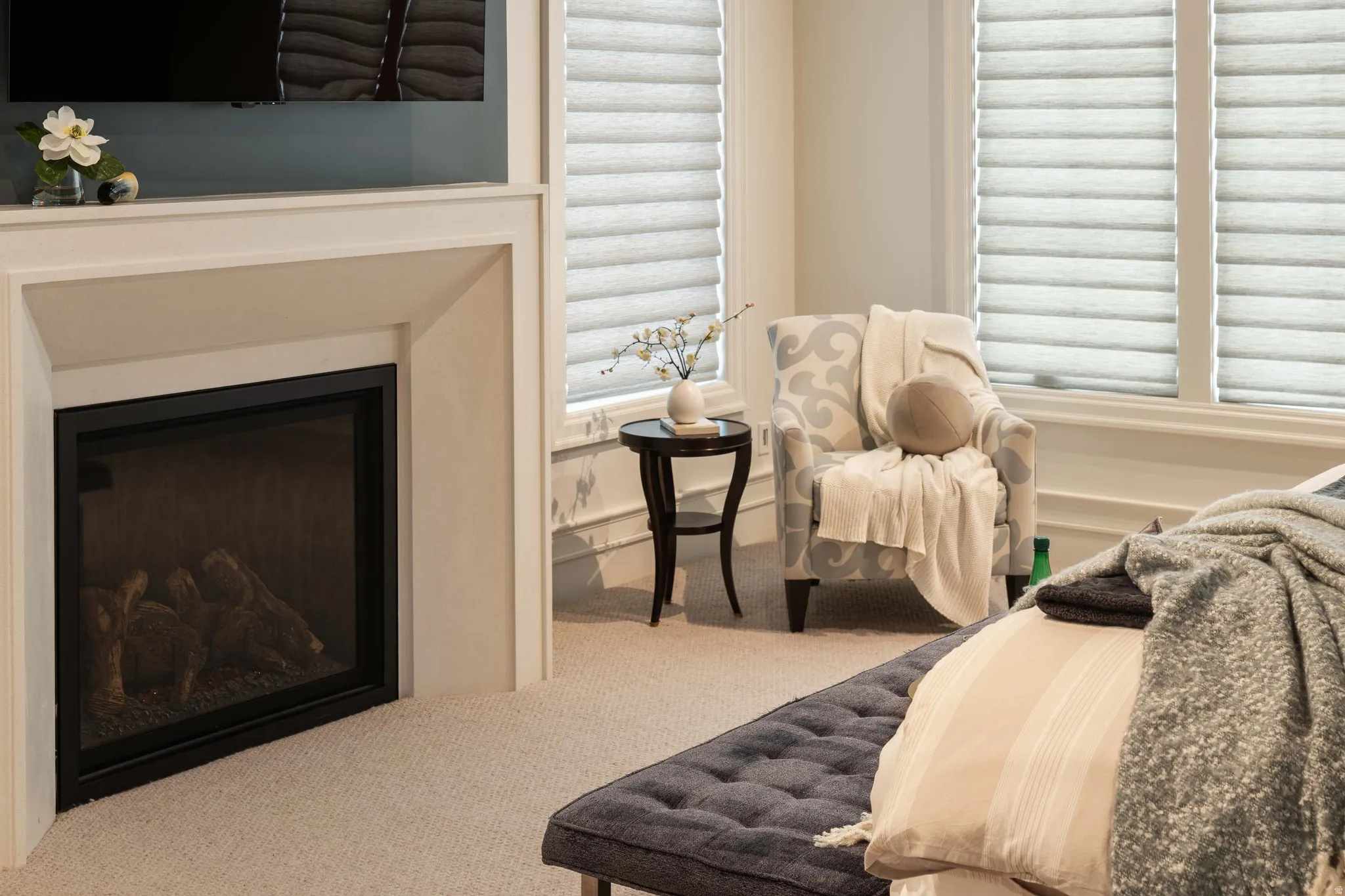 Corner fireplace with a clean-lined white surround