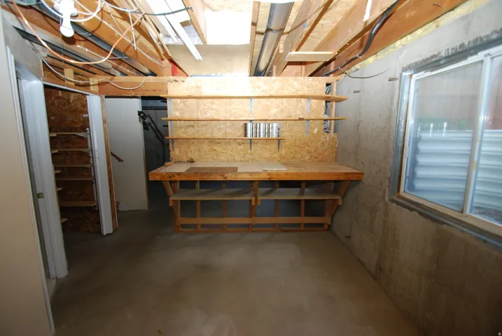 Concrete flooring and exposed ceiling beams