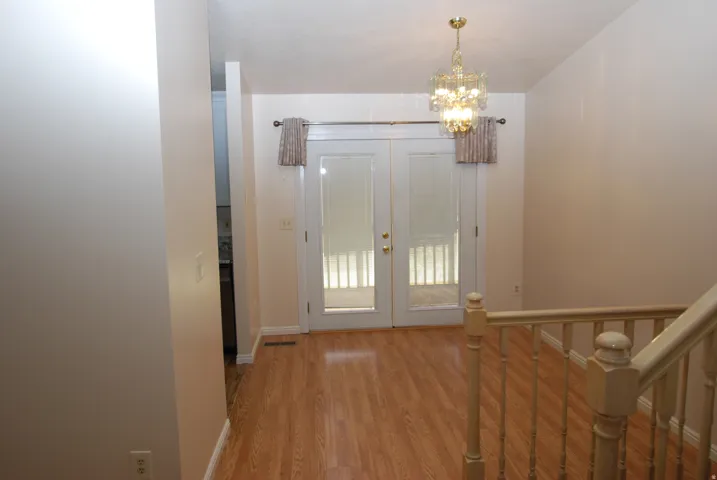 Warm wood-finish flooring throughout