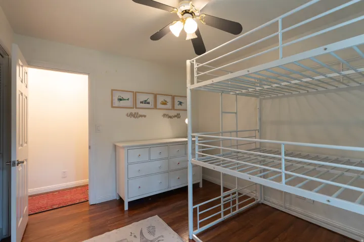 Nice big bedroom with wood floors, fans in everyroom!