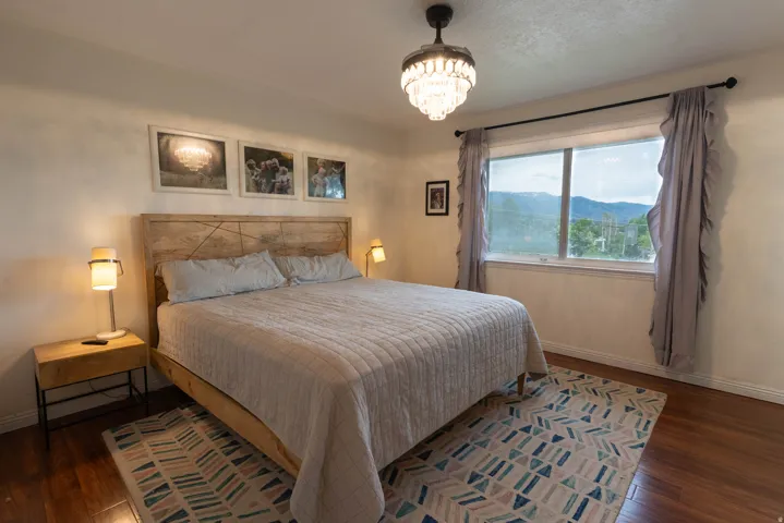 Biggest bedroom on the main floor, checkout the views!  There's an attached three quarter bathroom !