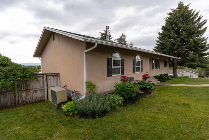 Corner lot with a terraced back yard.