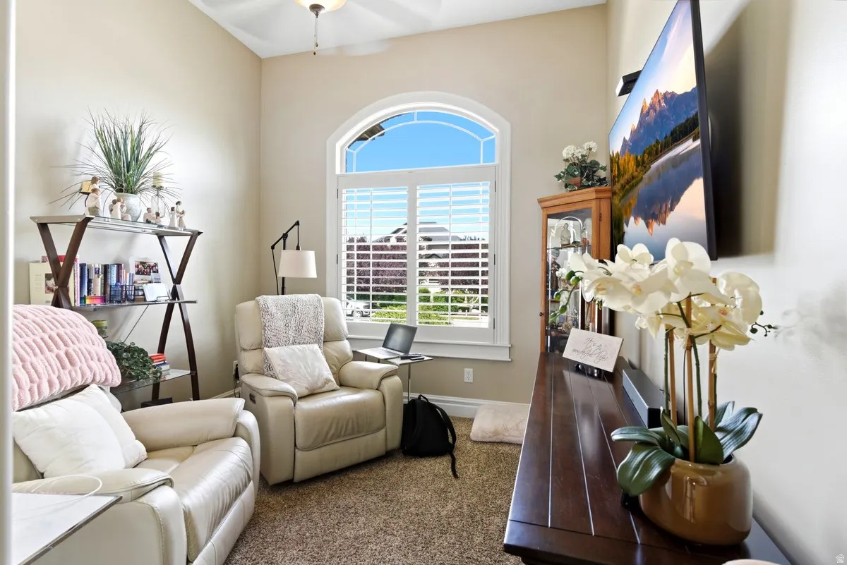 Arch-top window with plantation shutters