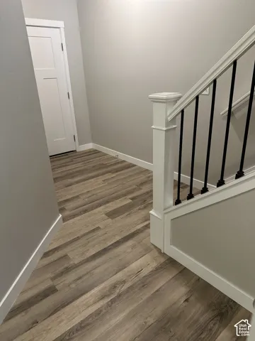 Hard-surface wood-finish flooring throughout