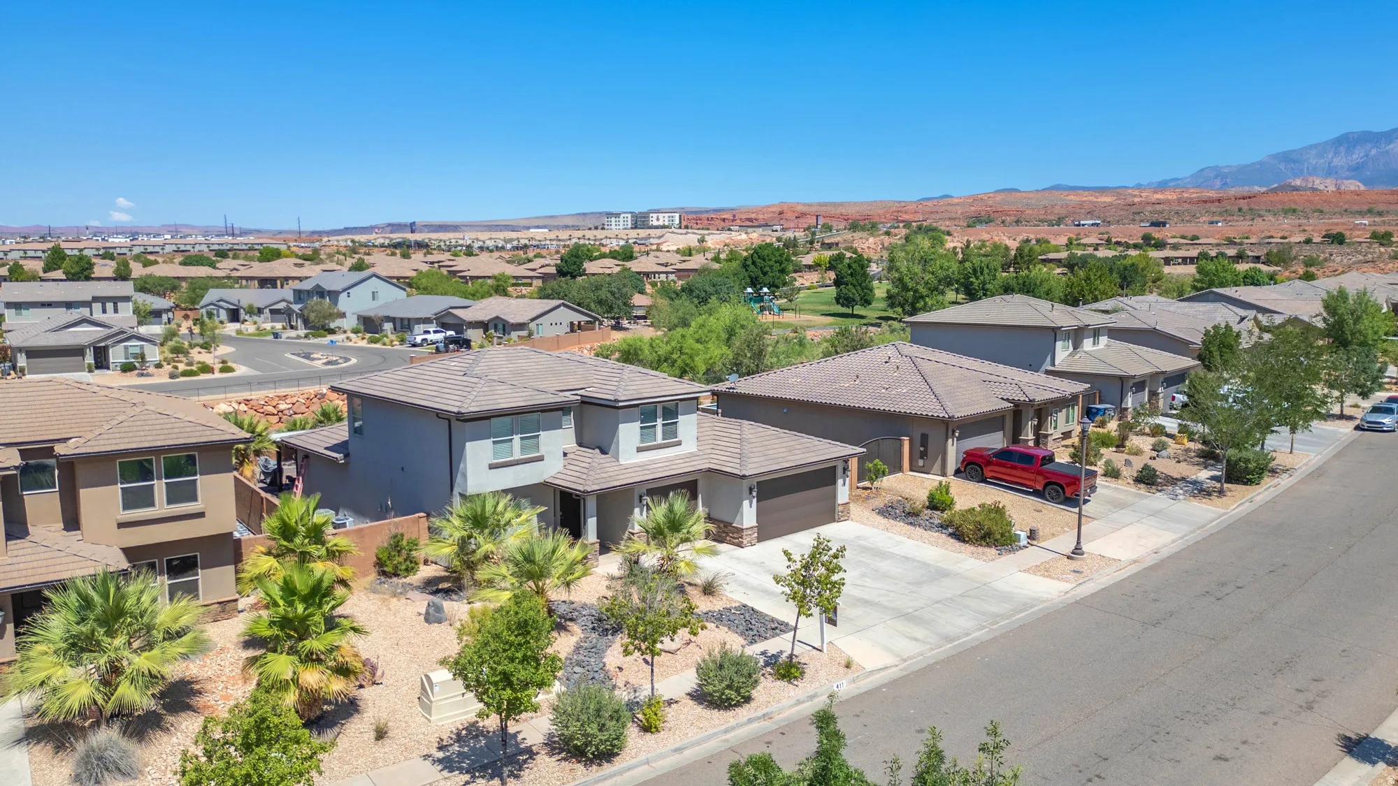 Residential community with desert landscaping and paved streets