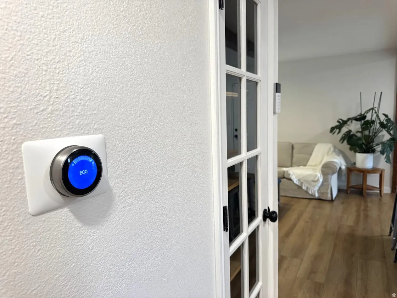 Smart thermostat with a blue display screen