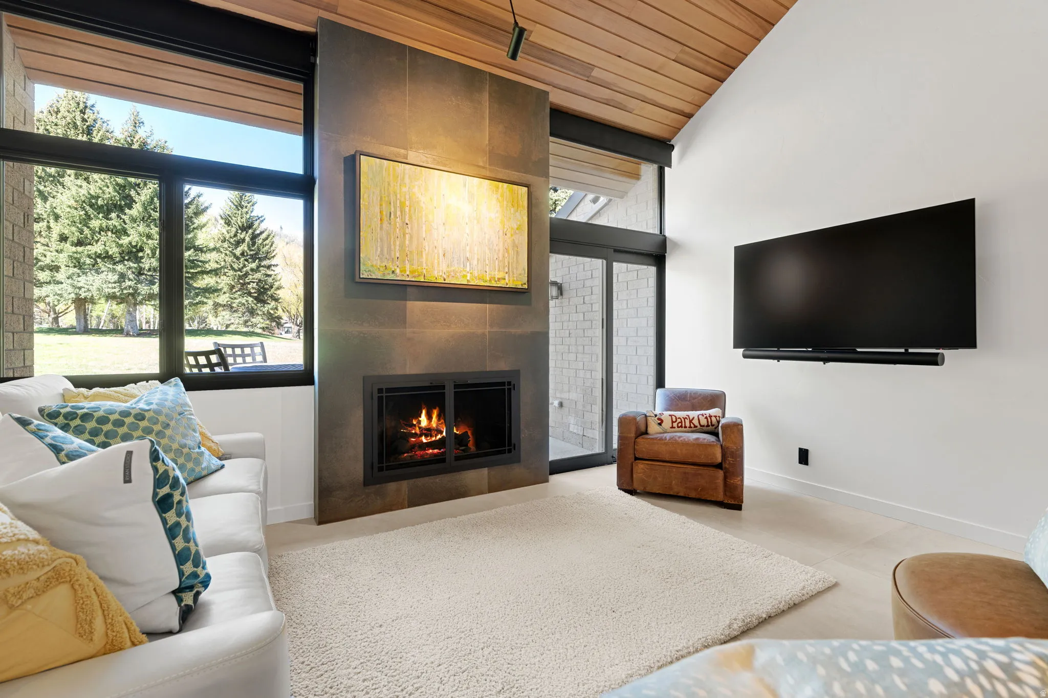Vaulted wood-paneled ceiling accenting a contemporary living space