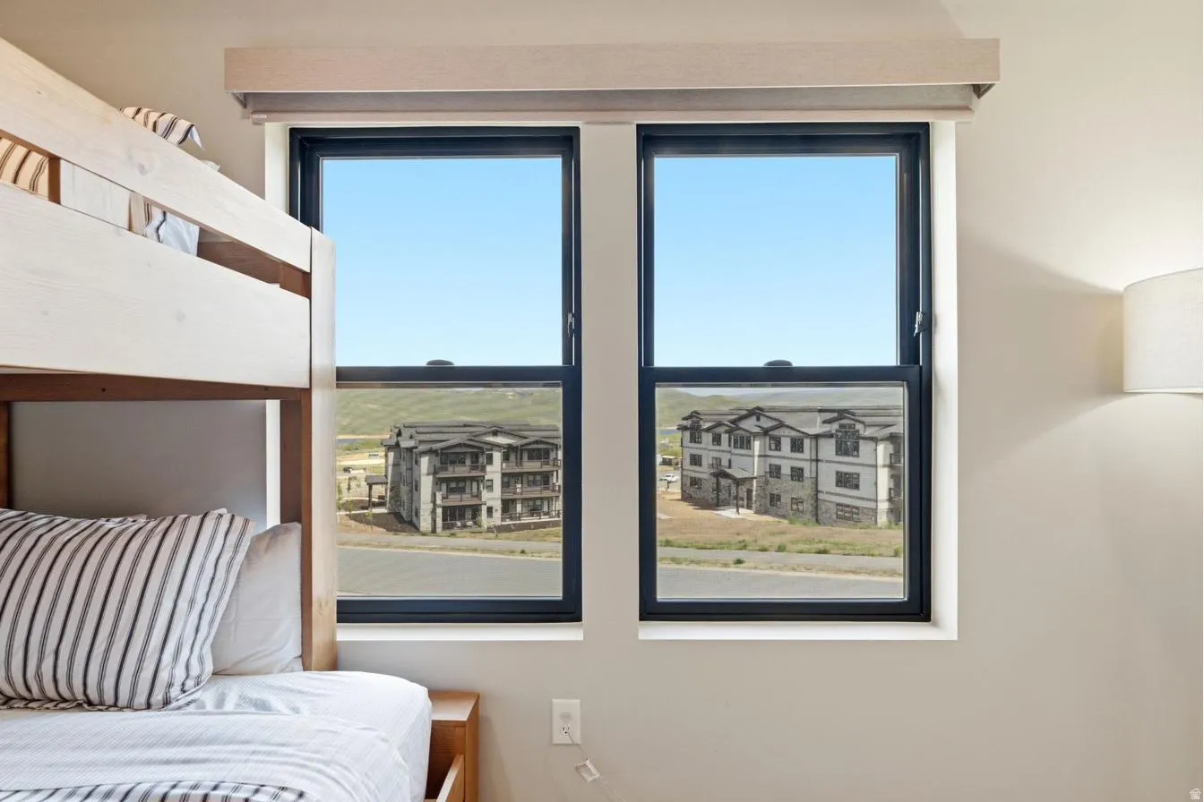 Dual windows with black frames and white trim