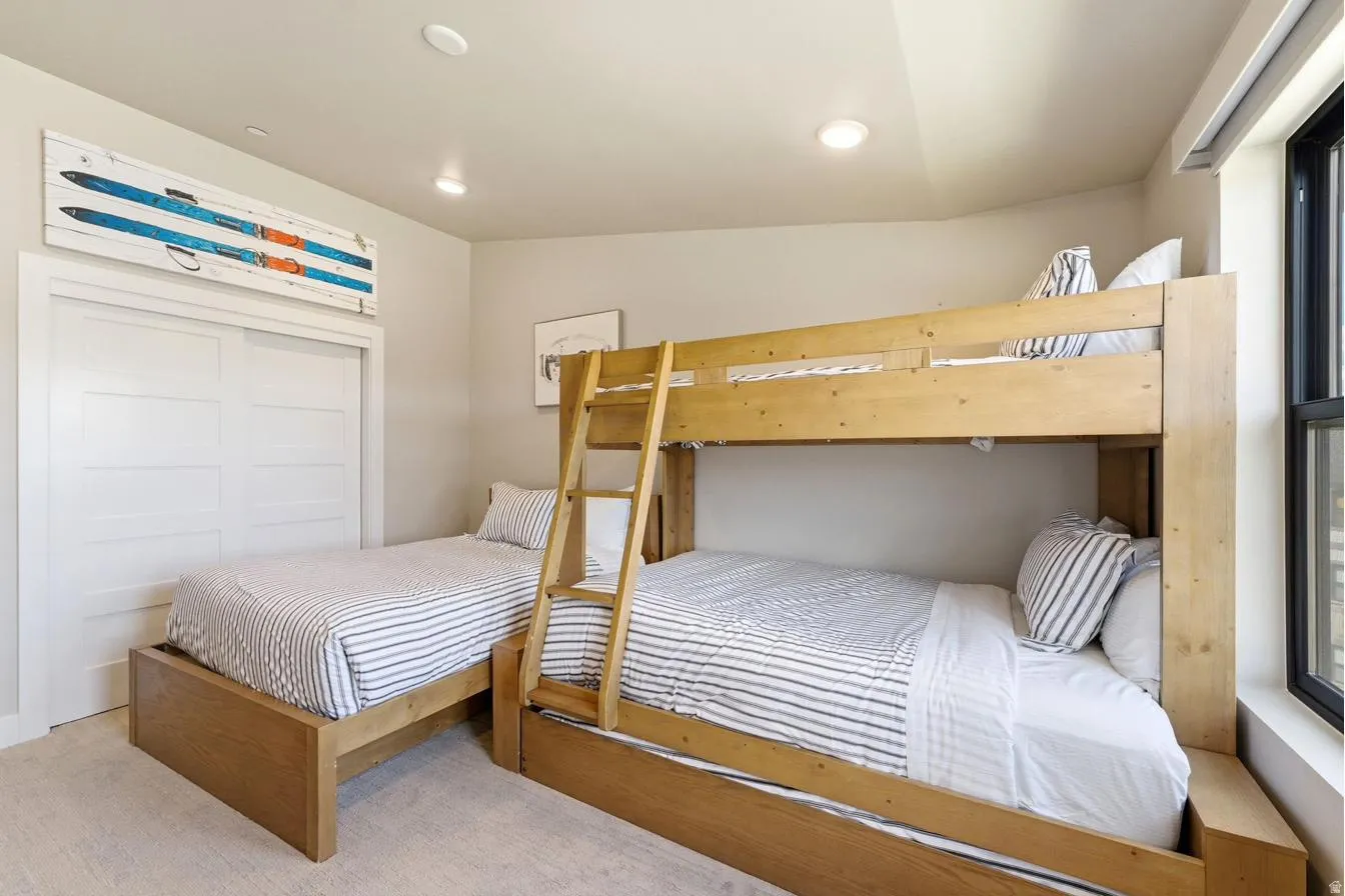 Neutral-toned walls complement recessed ceiling lighting