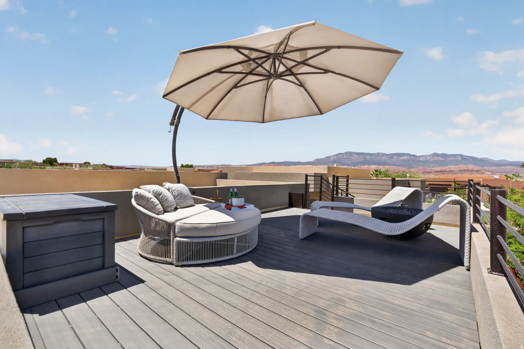 Rooftop patio #3 Perfect for star gazing and taking in the breathless views. Featuring composite decking, a partial privacy wall, and metal railings
