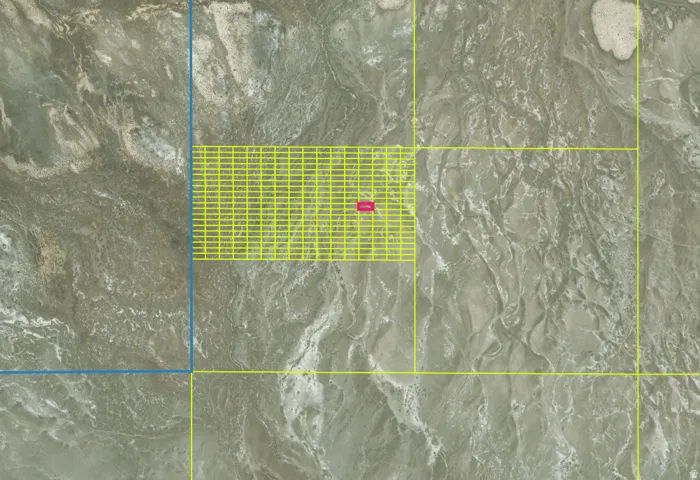 Aerial Property Map. Displaying property boundaries and grid overlay for a specific parcel