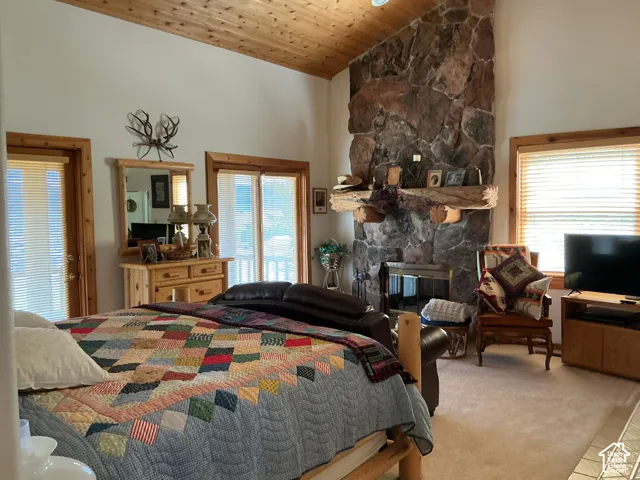 Vaulted wood-finish ceiling with recessed lighting