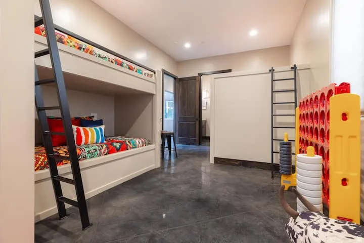 Built-in bunk beds featuring integrated ladders