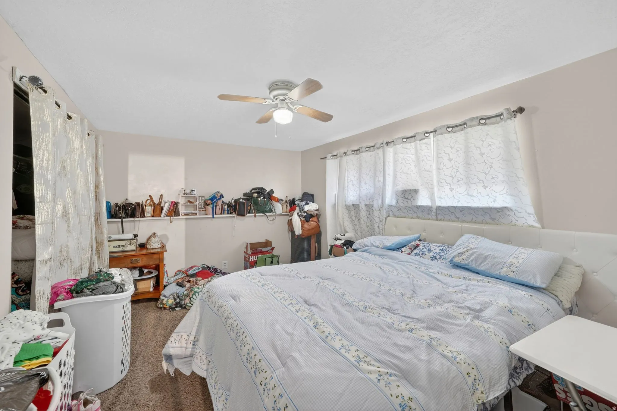 Recessed window with sheer privacy curtains
